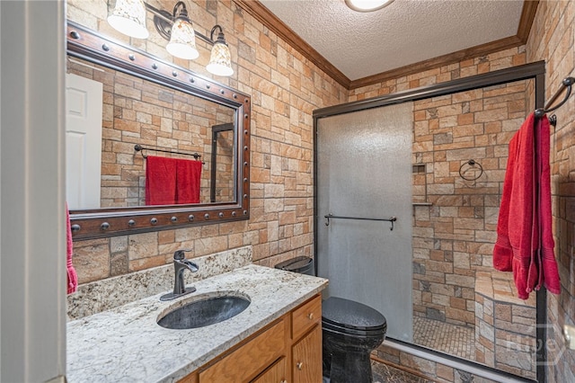 145 New Stillwell Rd, Springfield, GA 31329 - bathroom with ornamental molding, a textured ceiling, a stall shower, vanity, and toilet