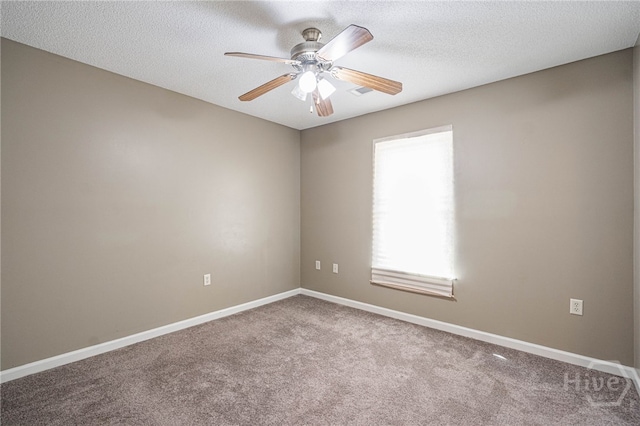 145 New Stillwell Rd, Springfield, GA 31329 - carpeted empty room with healthy amount of natural light, a ceiling fan, baseboards, and a textured ceiling