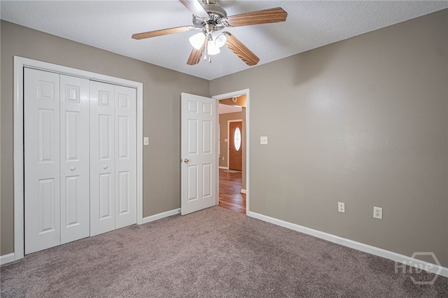 145 New Stillwell Rd, Springfield, GA 31329 - unfurnished bedroom featuring carpet flooring, baseboards, a closet, and a ceiling fan