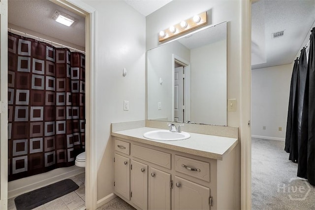1282 Long Bridge Rd, Rincon, GA 31326 - full bathroom with vanity, toilet, a shower with shower curtain, a textured ceiling, and baseboards