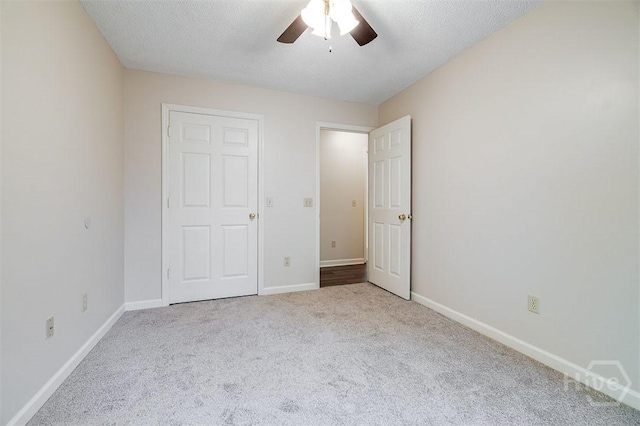 1282 Long Bridge Rd, Rincon, GA 31326 - unfurnished bedroom with carpet flooring, baseboards, and a ceiling fan