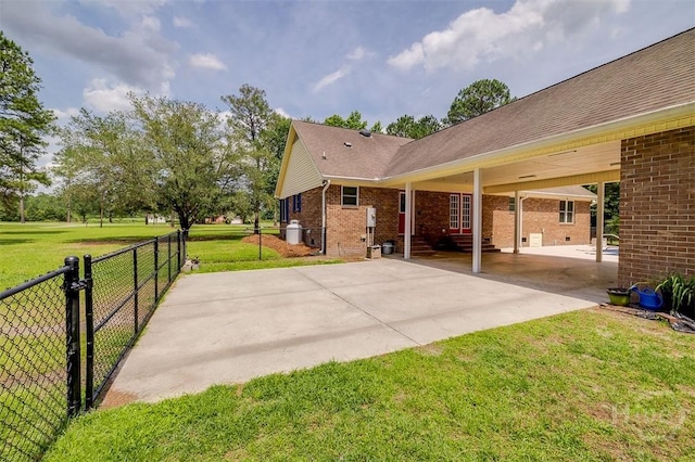 1282 Long Bridge Rd, Rincon, GA 31326 - view of patio featuring concrete driveway and a carport
