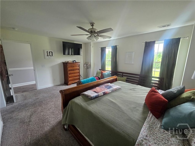 275 Hodgeville Rd, Rincon, GA 31326 - carpeted bedroom with multiple windows, ceiling fan, and baseboards