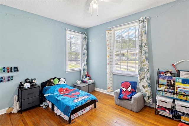 103 Pine Valley Rd, Savannah, GA 31404 - bedroom with wood finished floors, baseboards, and ceiling fan