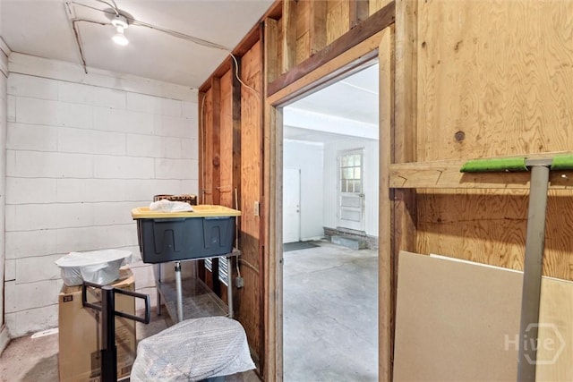 103 Pine Valley Rd, Savannah, GA 31404 - bathroom featuring concrete flooring, concrete block wall, and wooden walls