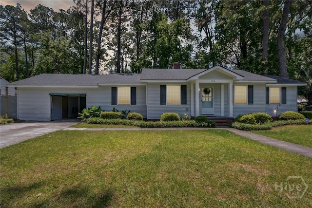 103 Pine Valley Rd, Savannah, GA 31404 - ranch-style home with concrete driveway, a chimney, and a yard