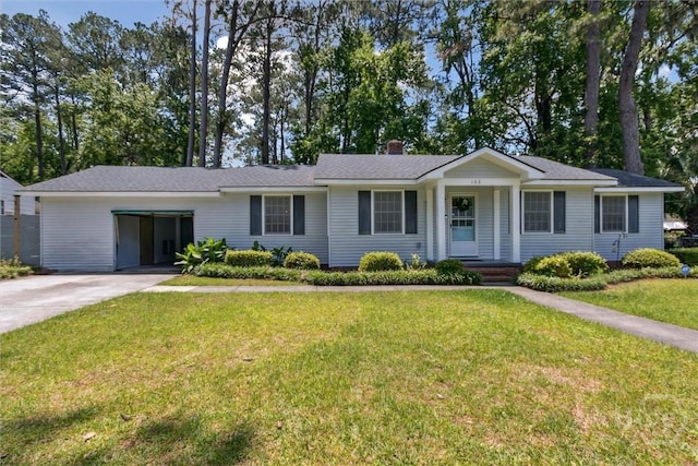 103 Pine Valley Rd, Savannah, GA 31404 - ranch-style home with driveway, a chimney, and a front lawn