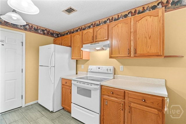 115 Ashley Dr, Guyton, GA 31312 - kitchen with white appliances, under cabinet range hood, light countertops, and a textured ceiling