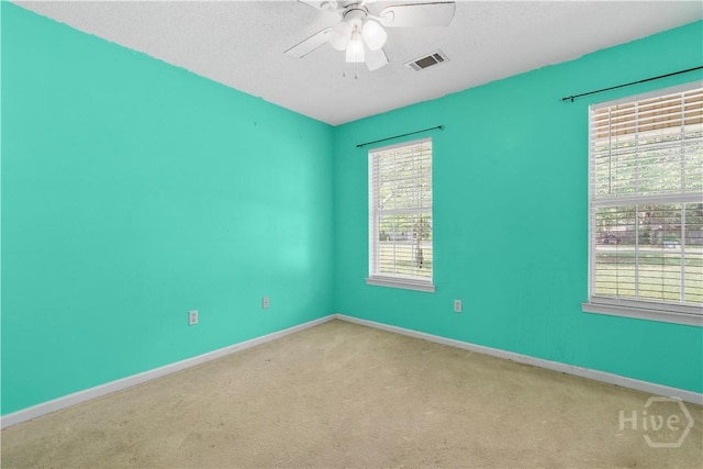 115 Ashley Dr, Guyton, GA 31312 - carpeted empty room with a ceiling fan and baseboards