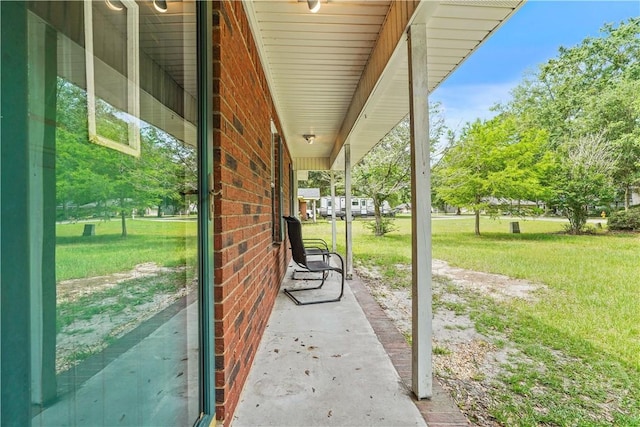 115 Ashley Dr, Guyton, GA 31312 - porch featuring a yard