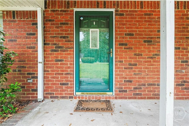 115 Ashley Dr, Guyton, GA 31312 - view of exterior entry featuring brick siding
