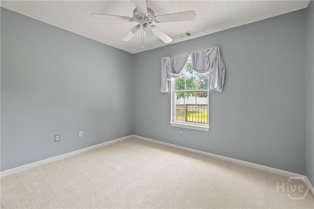 25 Ashley Ct, Richmond Hill, GA 31324 - carpeted empty room featuring baseboards, a textured ceiling, and a ceiling fan