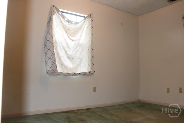 1029 Richards St, Savannah, GA 31415 - carpeted spare room featuring a textured ceiling and baseboards