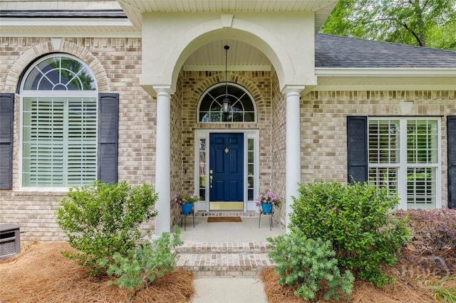 354 Brown Thrush Rd, Savannah, GA 31419 - property entrance with brick siding and roof with shingles