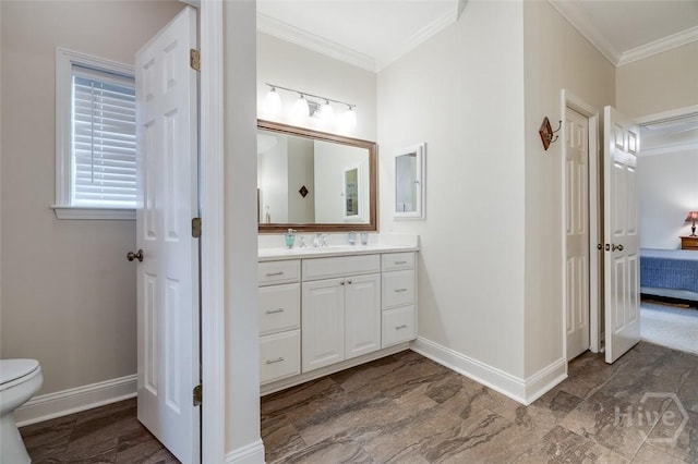 354 Brown Thrush Rd, Savannah, GA 31419 - bathroom featuring ornamental molding, baseboards, vanity, toilet, and connected bathroom
