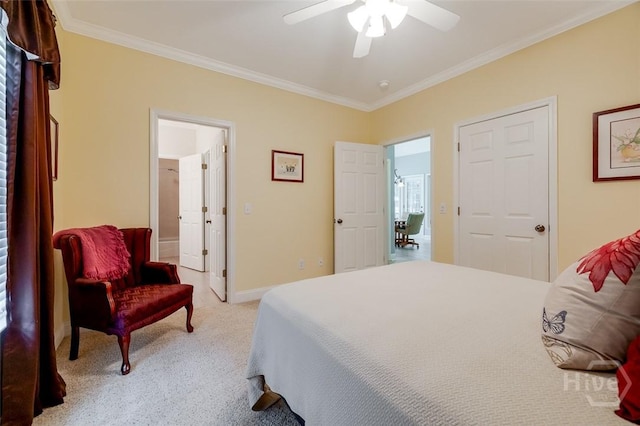 354 Brown Thrush Rd, Savannah, GA 31419 - bedroom with crown molding, light colored carpet, a ceiling fan, baseboards, and connected bathroom