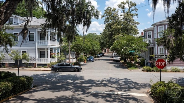 120 Brady St, Savannah, GA 31401 - view of asphalt road featuring traffic signs and curbs