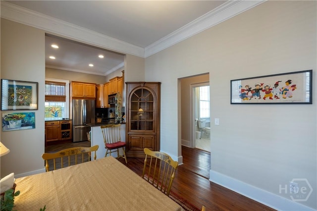 120 Brady St, Savannah, GA 31401 - dining room featuring ornamental molding, baseboards, dark wood-type flooring, and recessed lighting