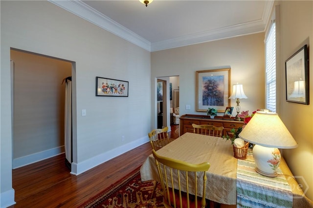 120 Brady St, Savannah, GA 31401 - dining room with ornamental molding, wood finished floors, and baseboards