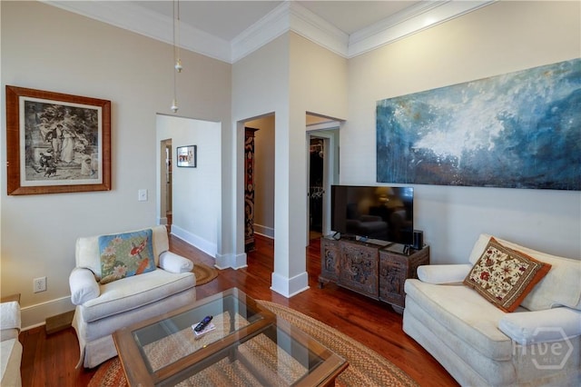 120 Brady St, Savannah, GA 31401 - living area with crown molding, wood finished floors, baseboards, and a high ceiling