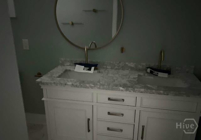 716 W 51st St, Savannah, GA 31405 - full bath with double vanity and marble look tiles