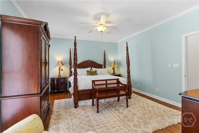 245 Montauk Dr, Richmond Hill, GA 31324 - bedroom with wood finished floors, ornamental molding, baseboards, and a ceiling fan