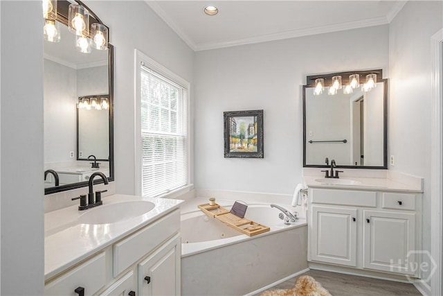 22 Sparnel Rd, Savannah, GA 31411 - full bath with two vanities, a jetted tub, crown molding, and recessed lighting