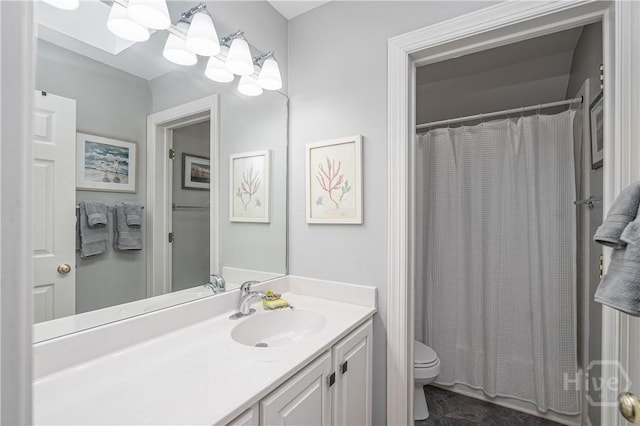 22 Sparnel Rd, Savannah, GA 31411 - bathroom featuring toilet, vanity, and a shower with shower curtain