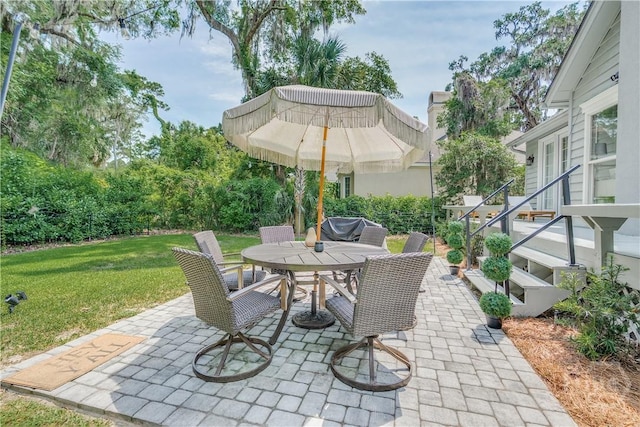 22 Sparnel Rd, Savannah, GA 31411 - view of patio / terrace featuring outdoor dining area