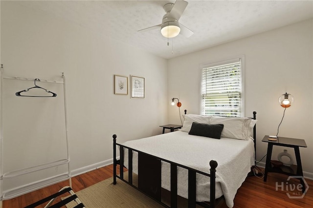 355 Riverview Dr, Savannah, GA 31404 - bedroom with wood finished floors, baseboards, and ceiling fan