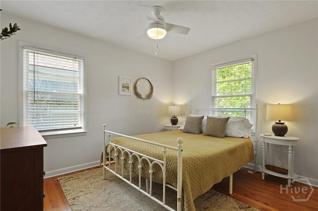 355 Riverview Dr, Savannah, GA 31404 - bedroom with wood finished floors, baseboards, and ceiling fan