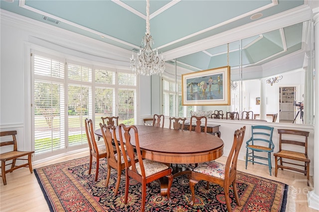 4 Longwater Ln, Savannah, GA 31411 - dining space featuring ornamental molding, a chandelier, plenty of natural light, and wood finished floors