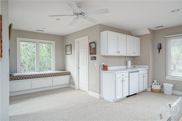 4 Longwater Ln, Savannah, GA 31411 - kitchen featuring healthy amount of natural light, white cabinets, light carpet, and recessed lighting
