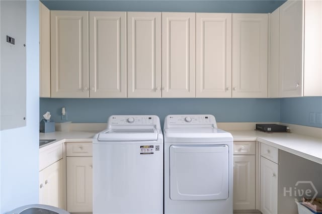 4 Longwater Ln, Savannah, GA 31411 - laundry area with cabinet space and washer and dryer