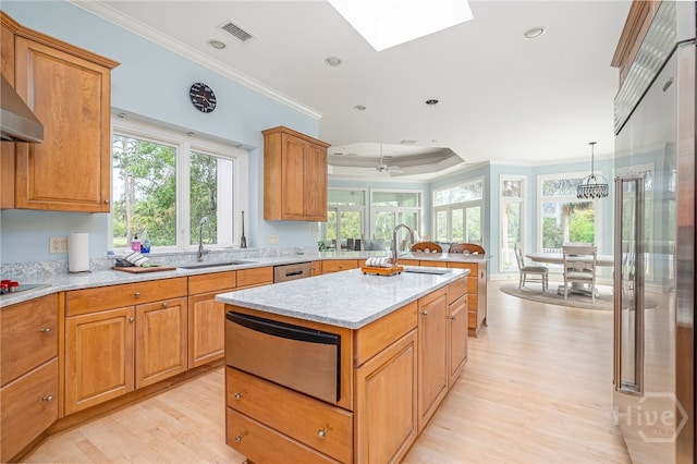 4 Longwater Ln, Savannah, GA 31411 - kitchen featuring stainless steel built in refrigerator, a sink, a warming drawer, ornamental molding, and light wood-style floors