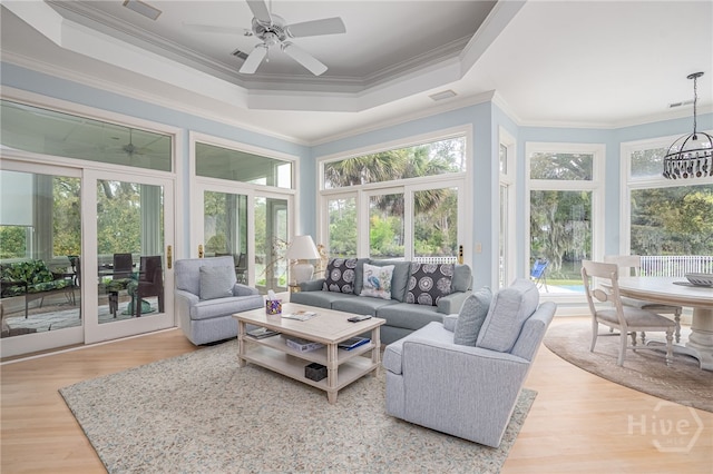 4 Longwater Ln, Savannah, GA 31411 - sunroom featuring wood finished floors, ornamental molding, french doors, a deck, and a raised ceiling