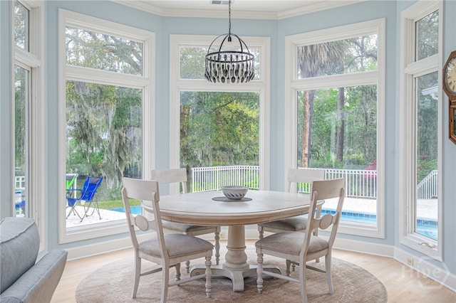 4 Longwater Ln, Savannah, GA 31411 - sunroom with a chandelier and healthy amount of natural light