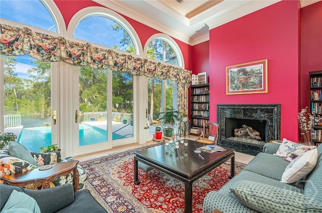 4 Longwater Ln, Savannah, GA 31411 - living area featuring ornamental molding, a high ceiling, and a high end fireplace