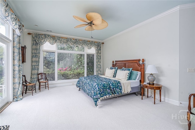 4 Longwater Ln, Savannah, GA 31411 - bedroom with carpet flooring, crown molding, multiple windows, and a ceiling fan