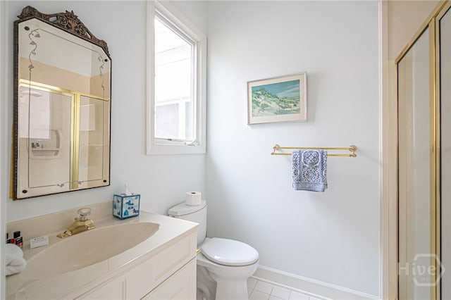 4 Longwater Ln, Savannah, GA 31411 - bathroom with a stall shower, vanity, toilet, tile patterned flooring, and baseboards