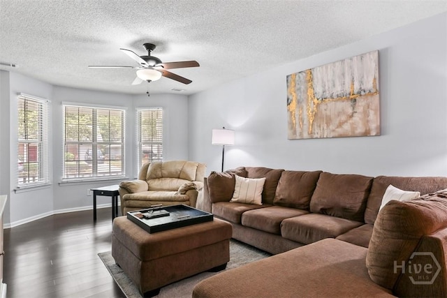 125 Penn Sta, Savannah, GA 31410 - living area with ceiling fan, dark wood finished floors, a textured ceiling, and baseboards