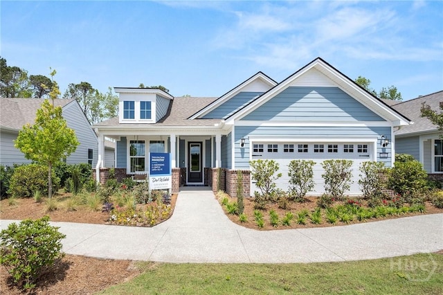333 Birch Dr, Richmond Hill, GA 31324 - craftsman inspired home with brick siding and an attached garage