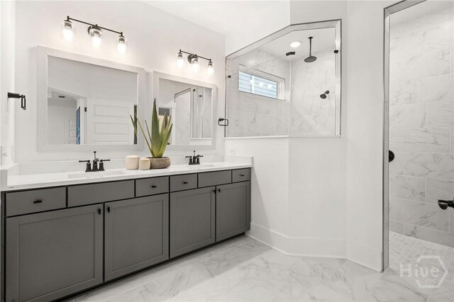 333 Birch Dr, Richmond Hill, GA 31324 - full bath with marble look tile flooring, baseboards, a walk in shower, and double vanity
