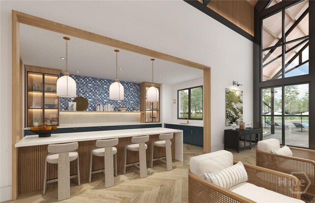 333 Birch Dr, Richmond Hill, GA 31324 - community bar area with decorative light fixtures and a high ceiling