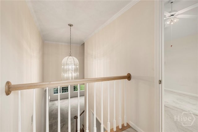205 Meadowlark Cir, Savannah, GA 31419 - stairway with carpet, a chandelier, a ceiling fan, and crown molding