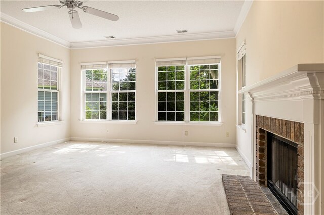 205 Meadowlark Cir, Savannah, GA 31419 - unfurnished living room with ornamental molding, a brick fireplace, carpet floors, plenty of natural light, and ceiling fan