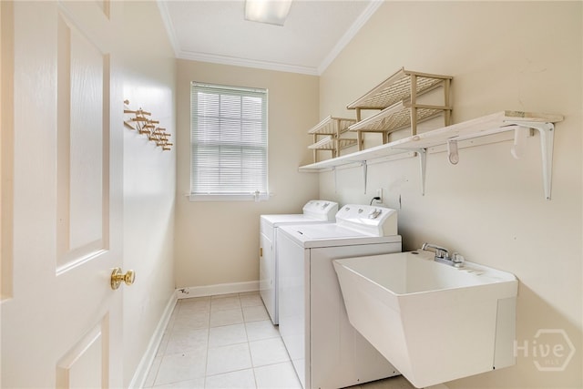 205 Meadowlark Cir, Savannah, GA 31419 - laundry room with crown molding, washing machine and dryer, baseboards, and light tile patterned flooring