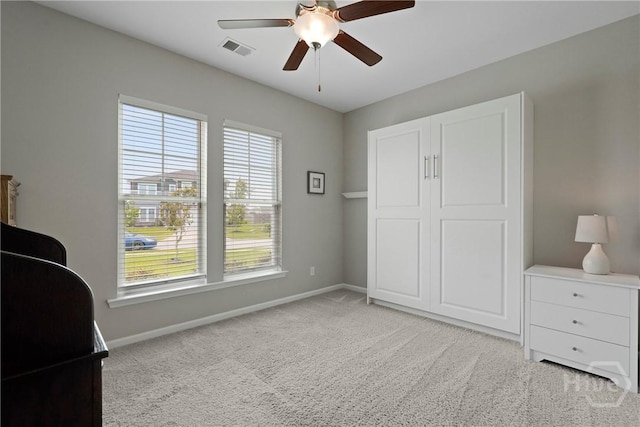 2 Chimney Ct, Savannah, GA 31407 - bedroom with light colored carpet, baseboards, and ceiling fan