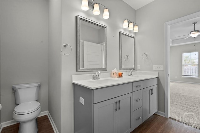 2 Chimney Ct, Savannah, GA 31407 - full bathroom with toilet, double vanity, baseboards, and wood finished floors