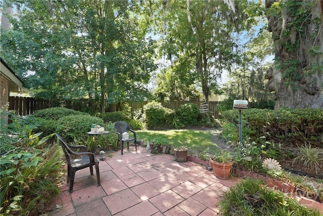 604 Windsor Rd, Savannah, GA 31419 - fenced backyard with a patio